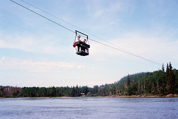 River flows were most reliably estimated by measuring the water velocity and depth at regular intervals, while pulling the cable car
across the river.